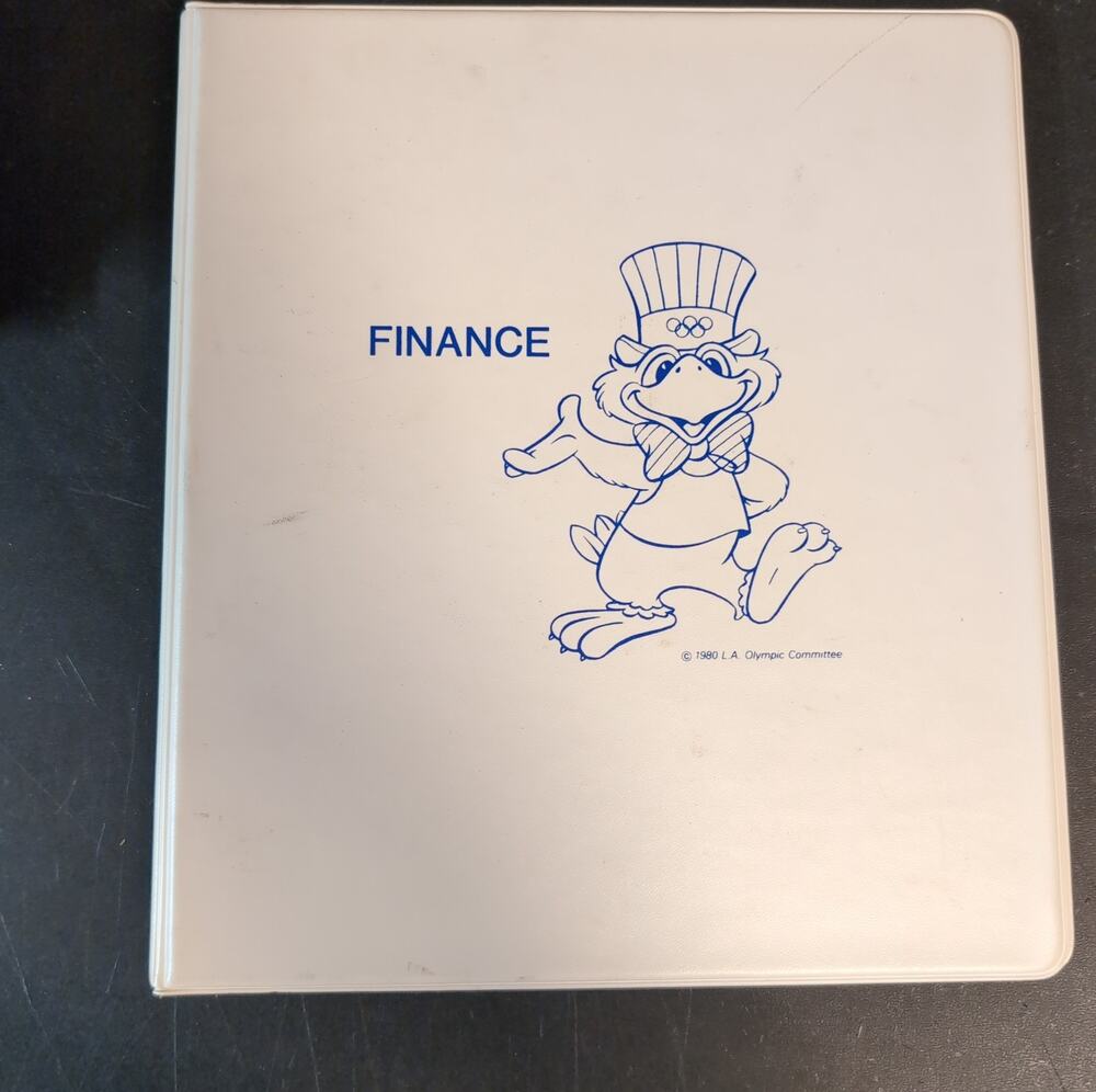 1980 Los Angeles Olympic Committee "FINANCE" vintage white three-ring binder